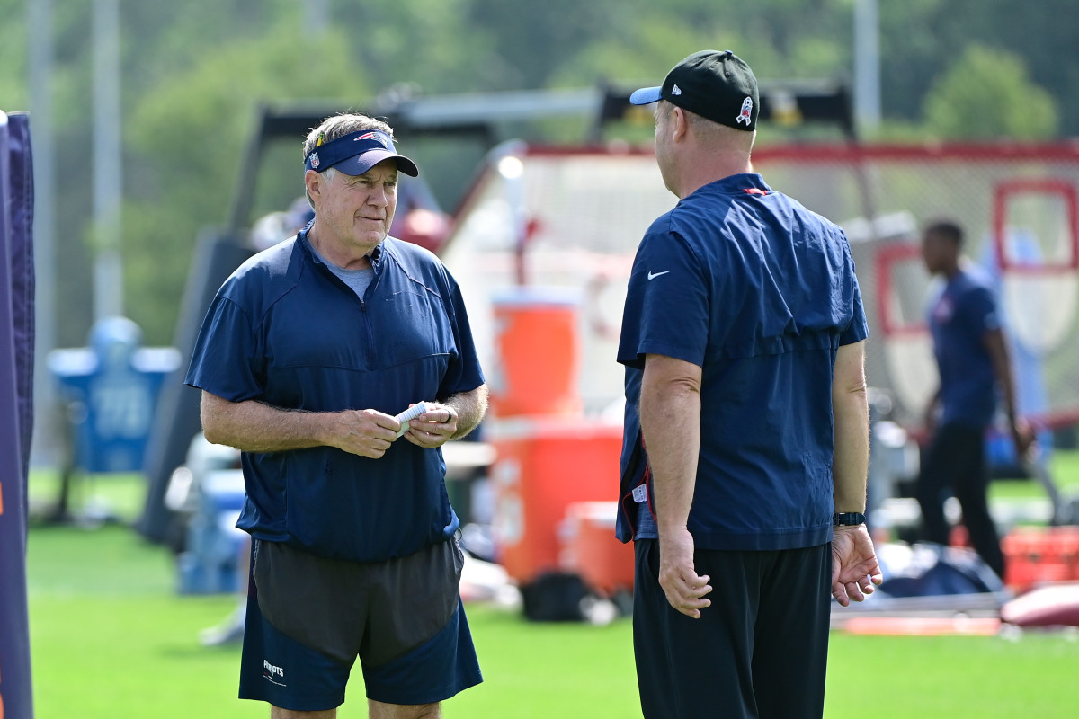 Jul 26, 2023; Foxborough, MA, USA; New England Patriots head coach Bill Belichick speaks to offensive coordinator/quarterbacks coach Bill O'Brien during training camp at Gillette Stadium. 